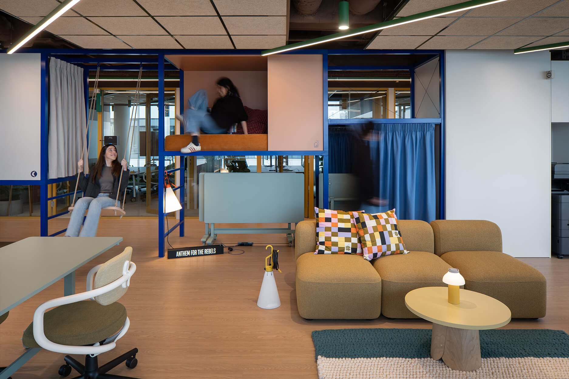 central lounge area with blue structure Nordeus workspace interior