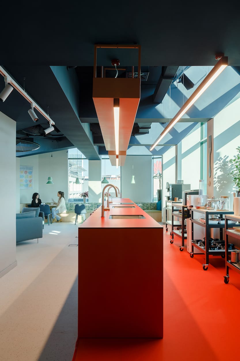 central coffee preparation counter in Generali office workspace interior